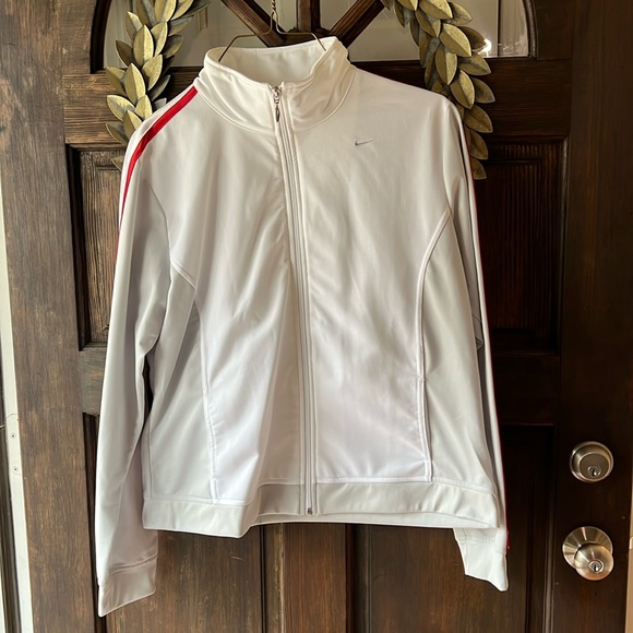 Nike Jackets & Blazers - NWOT- Nike track jacket with red stripes down sleeve. Zips to bottom. 2 Pockets